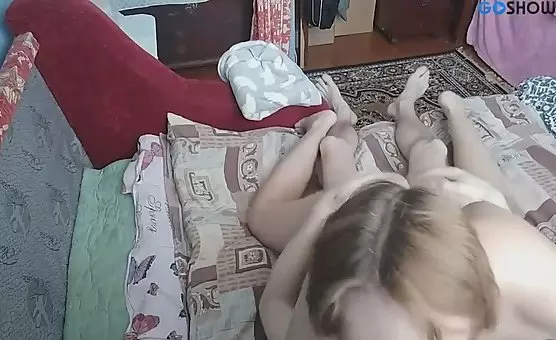 Hot couple indulging in sensual games with toys and oral pleasure